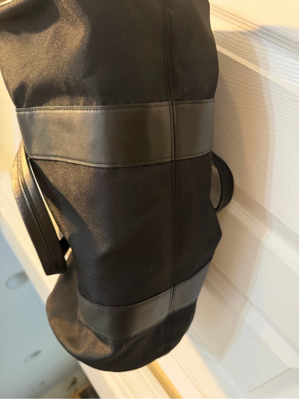 Givenchy Parfums Black Duffel Bag with Red Shoulder Pad